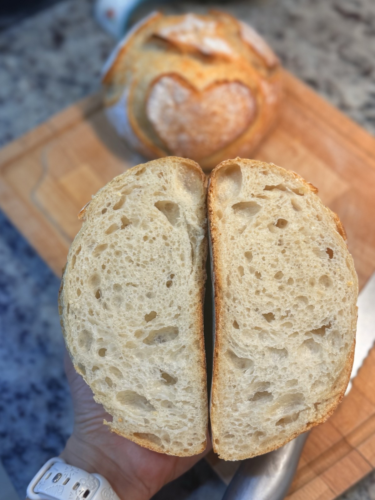 Open sourdough crumb showing the air pocket structure from proper long fermentation